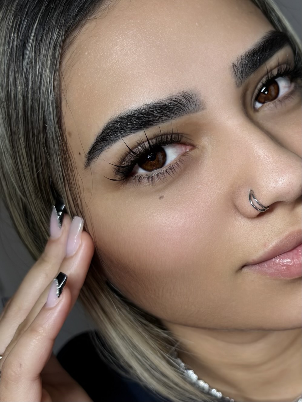 Client portrait showing natural lash enhancement